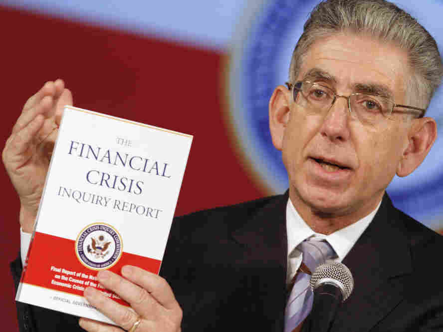 Financial Crisis Inquiry Commission Chairman Phil Angelides with the official commission report.