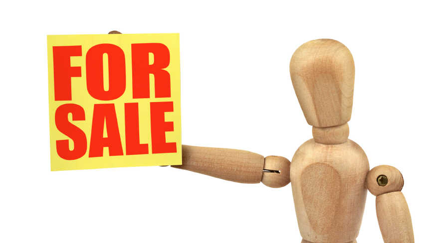 figure holding a sale announcement isolated on white background