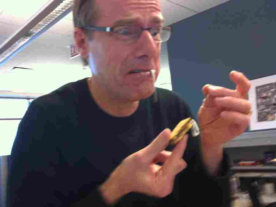 Robert eats the s'more.
