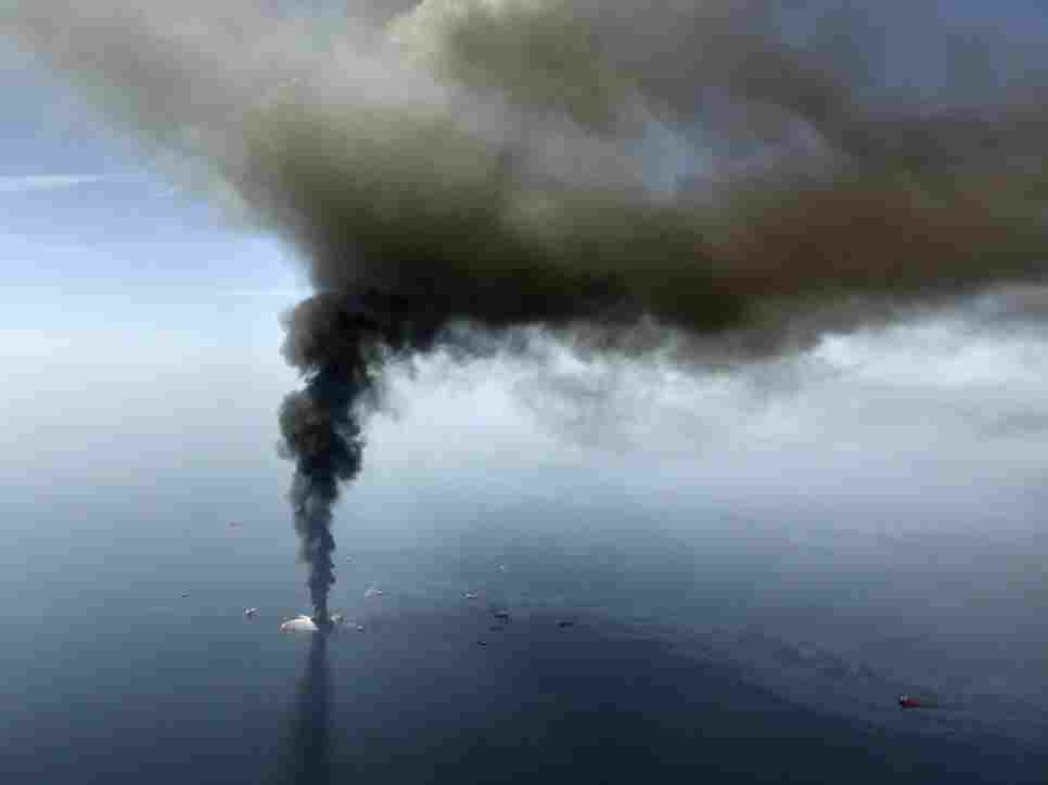 The Deepwater Horizon oil rig burns in the Gulf of Mexico.