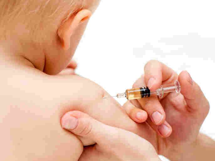 A child gets immunized.