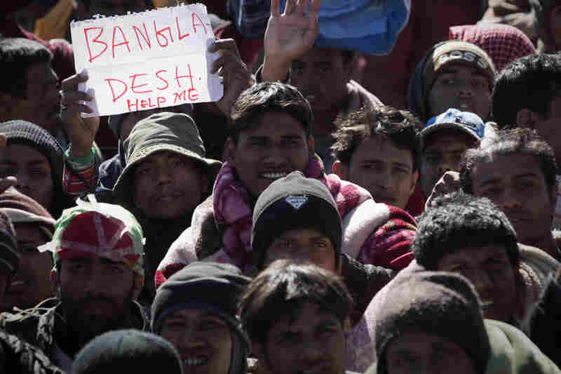 Thousands in Libya wait to cross into Tunisia via the Ras Jedir border crossing on Wednesday. The UN refugees agency has made a plea to end the gridlock at the Tunisia border. 