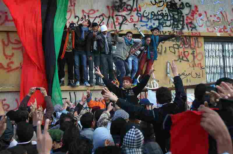Crowds celebrate in Benghazi on Saturday, still demanding Gadhafi's removal from power. 