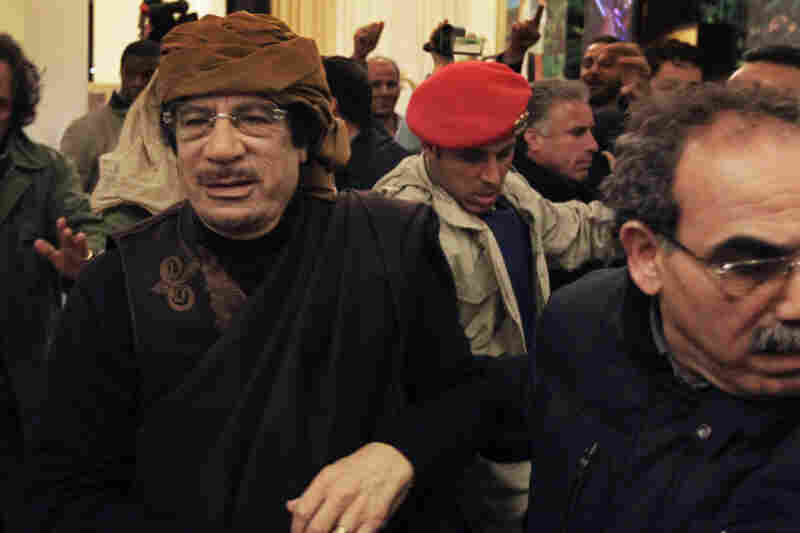 Libyan leader Moammar Gadhafi arrives at a hotel to give television interviews in Tripoli on Tuesday. 