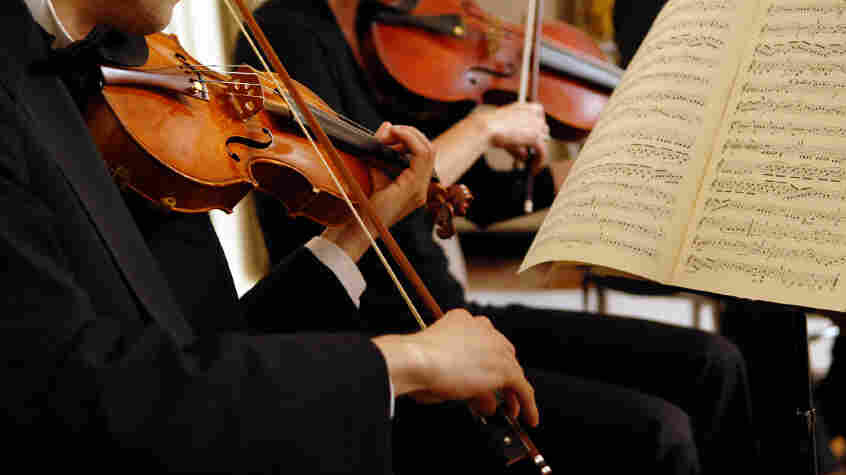 Man playing the violin.