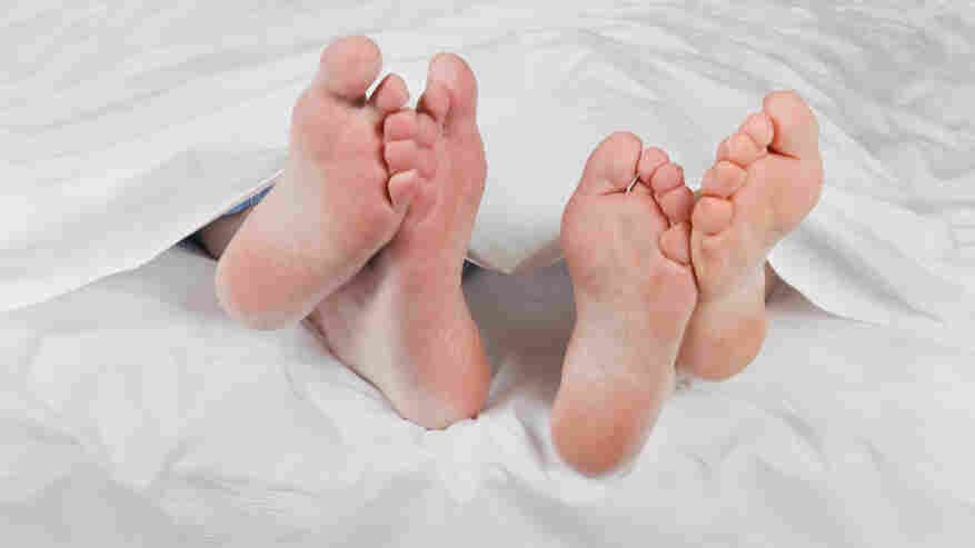 Two people in bed