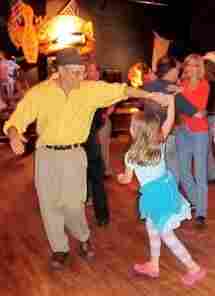 Peter and Willa dance.