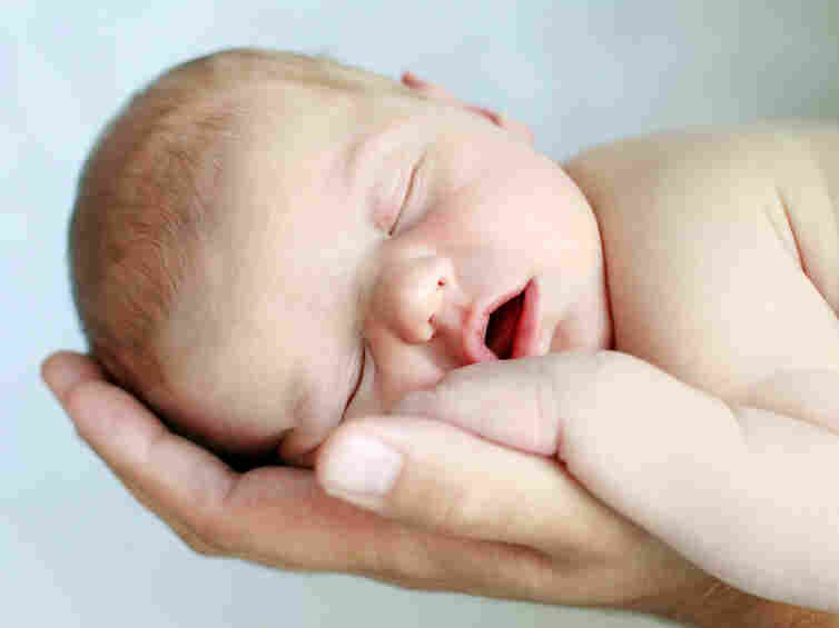 Portrait of a newborn baby sleeping.