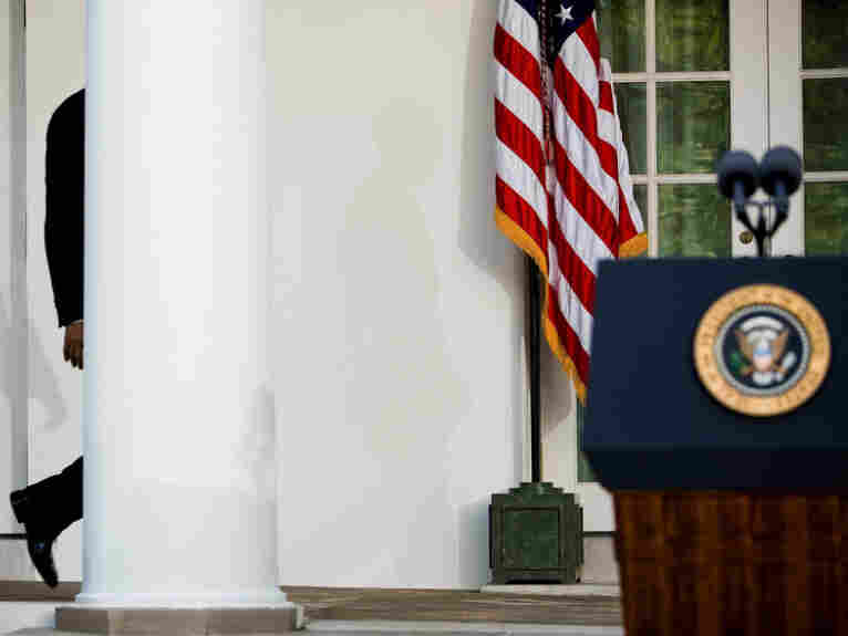President Obama walks to the podium in the Rose Garden of the White House to deliver remarks on the Senate Finance Committee's vote to approve health insurance reform in October 2009.