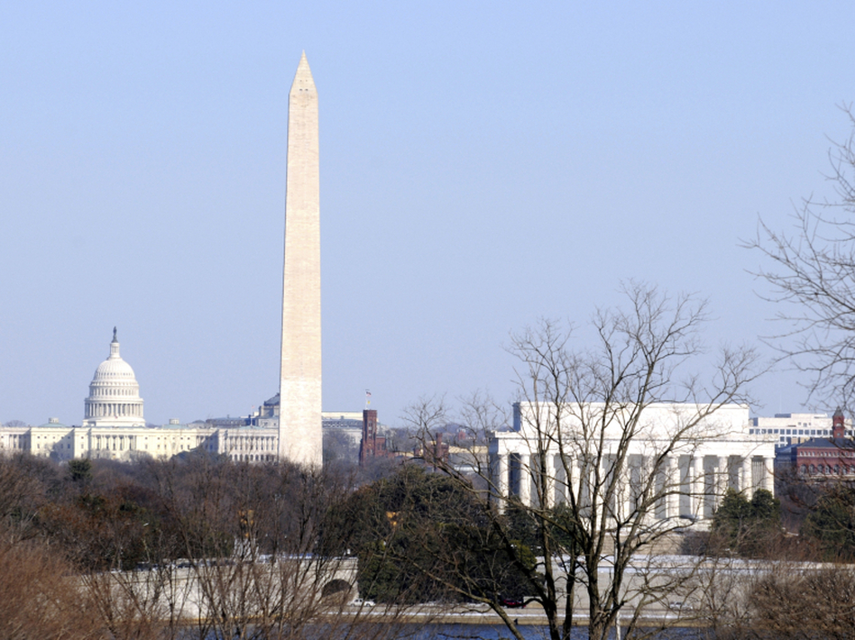 The Capitol Building, Washington Monument, Smithsonian Institution and Lincoln Memorial seen from across the Potomac River. In 2015, The African American History and Culture Museum will come to the Mall, but is being met with controversy. (mikadx/iStock)