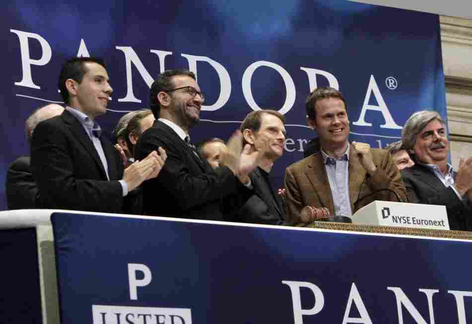 Joe Kennedy, third from left, CEO & President, and Tim Westergren, fourth from left, Chief Strategy Officer & Founder, of Pandora internet radio at the NYSE ringing the opening bell.