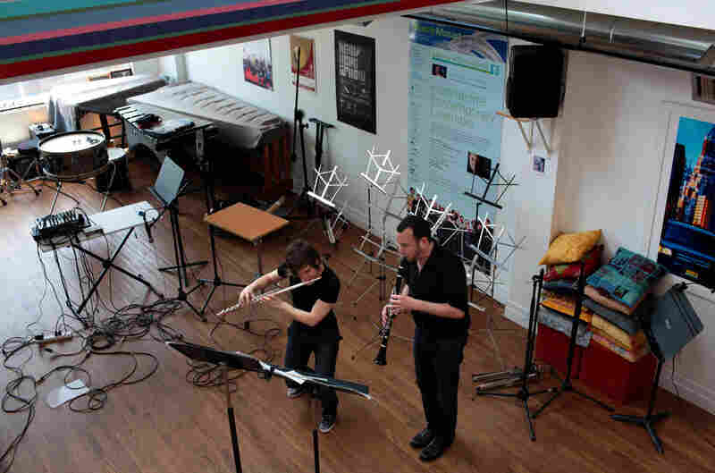 Downstairs at ICEhaus, Chase and Rubin rehearse Elliott Carter's "Esprit Rude/Esprit Doux II."