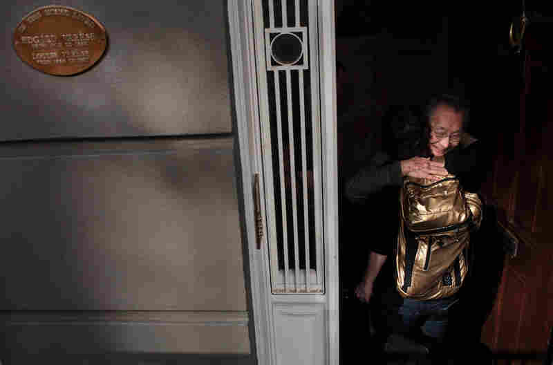 Chase is embraced by composer Chou Wen-chung when she arrives at his home in SoHo. A plaque outside commemorates Chou's teacher, legendary avant-garde composer Edgard Varese, who used to live there.