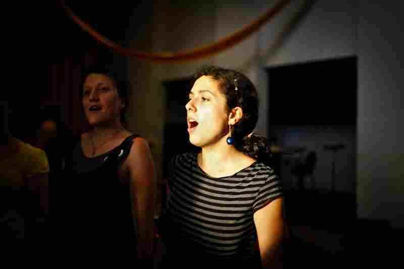 Tatyana Yanishevsky (center) rehearses with the Assembly of Light Choir.