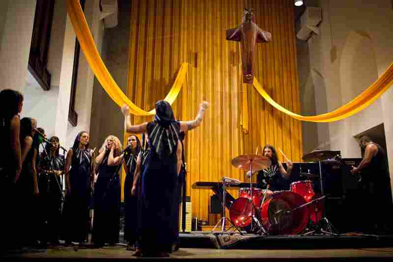 Chrissy Wolpert leads the Assembly of Light Choir, a rotating cast of 20 female vocalists, as it performs with The Body, a doom-metal band, on June 24 at St.Stephen's Episcopal church in Washington, D.C. 