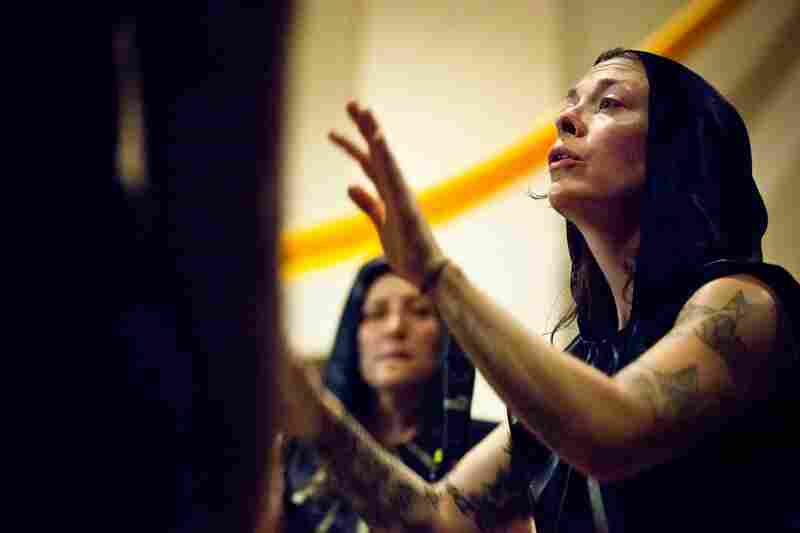 Wolpert leads the choir in song.