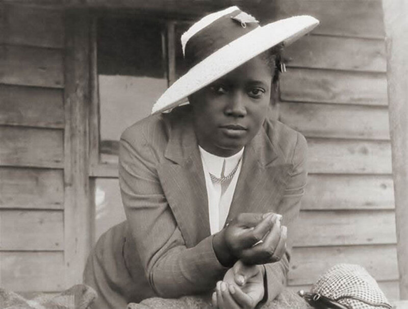 A North Carolina woman waits for a ride to church. "The date of the photograph is 1940, but the tilt of that hat is forever," blog curator Minh-Ha T. Pham writes.