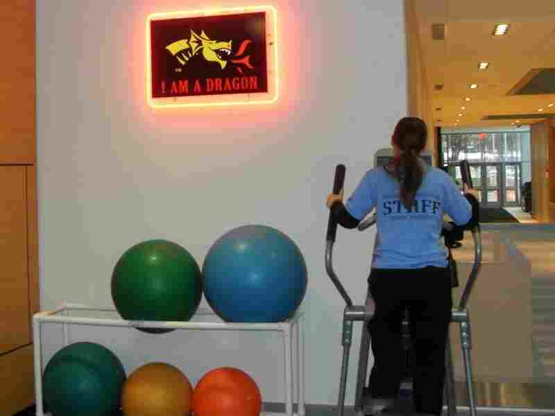 An elliptical at Drexel University's athletic facility powers an electric sign.