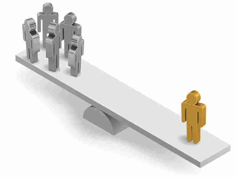 Figures on a balance