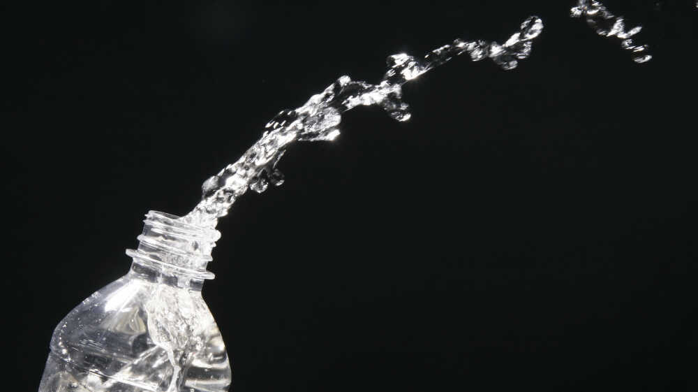 How Much Water Actually Goes Into Making A Bottle Of Water? : The Salt : NPR