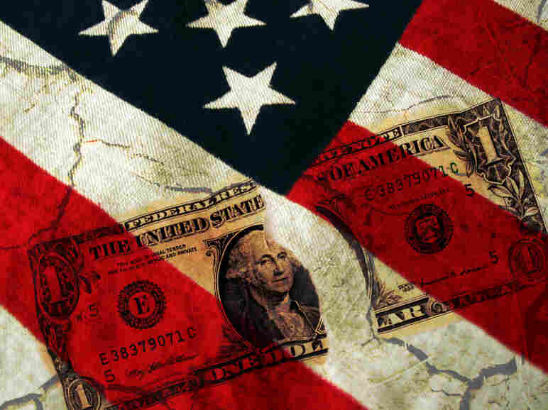 Dollar Bill across American Flag