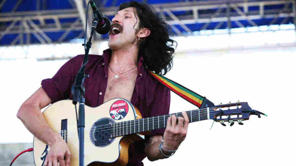 Eugene Hutz of Gogol Bordello performs at the 2011 Newport Folk Festival.