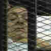 Bedridden And Caged, Mubarak Pleads Not Guilty