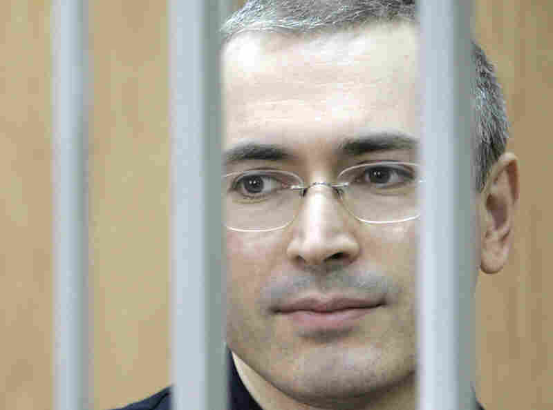 Mikhail Khodorkovsky, former head of the Yukos oil company and once the richest man in Russia, stands in a defendant's cage in a Moscow courtroom in 2005. He was convicted of fraud and tax evasion, and sentenced to hard labor. The European Court of Human Rights later ruled that use of the cage violated Khordorkovsky's right against "degrading treatment." 