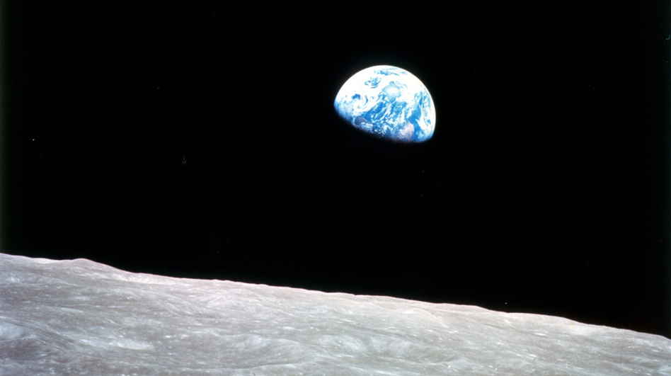 While orbiting the moon, Apollo 8 astronauts were greeted by this view of the rising earth. Today, competitors in the Google Lunar X PRIZE are trying to build robots that could reach the moon by the end of 2015. (NASA )