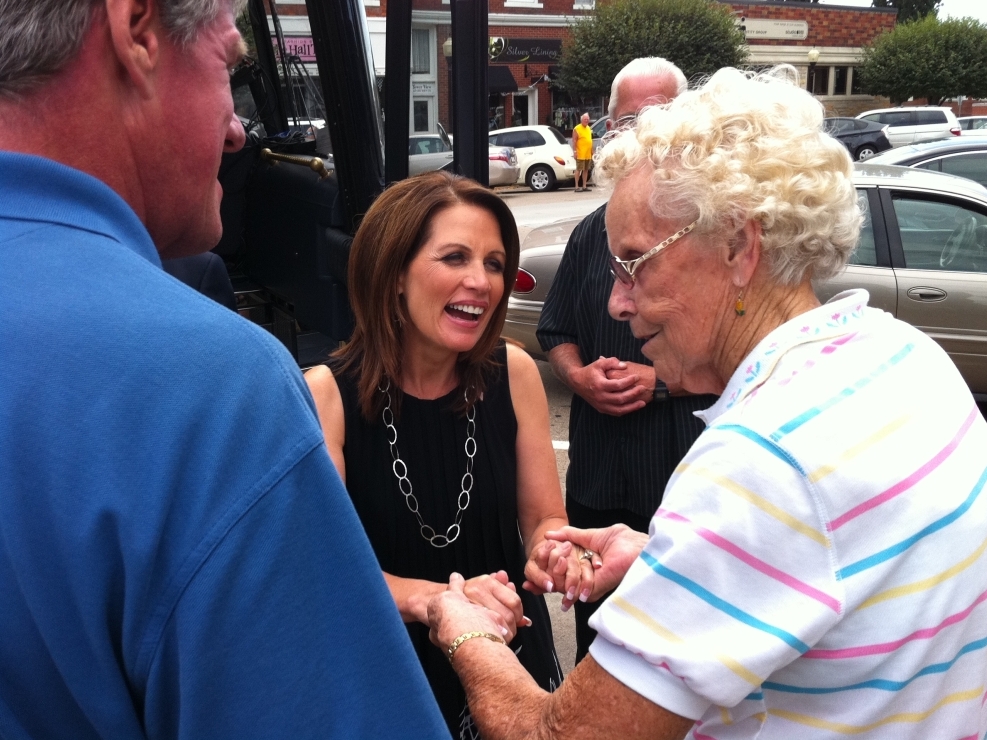 Rep. Michele Bachmann greets a voter in Pella, Iowa. (NPR)