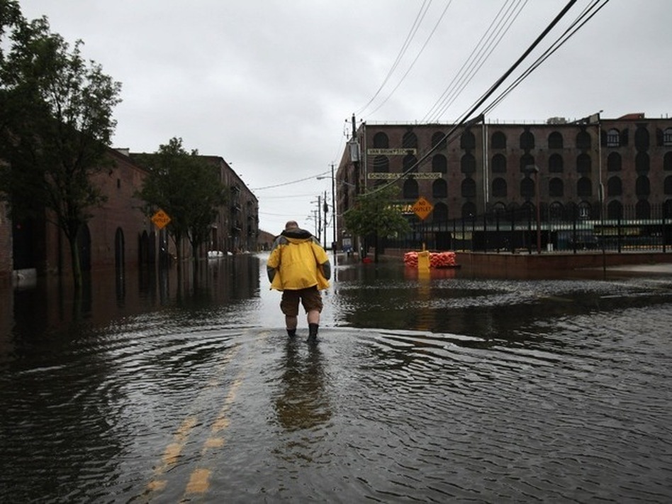 Water sits on the streets of Brooklyn's Red Hook neighborhood on Sunday. (Spencer Platt/Getty Images)