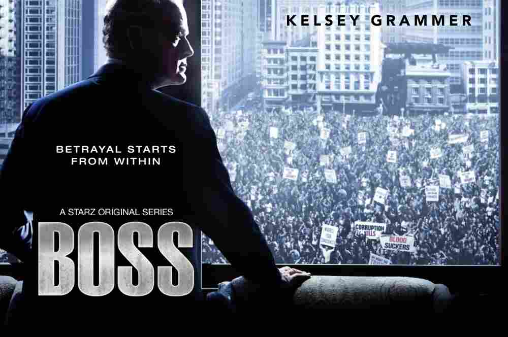 Kelsey Grammer looking darkly out a window in Starz' new series, Boss.