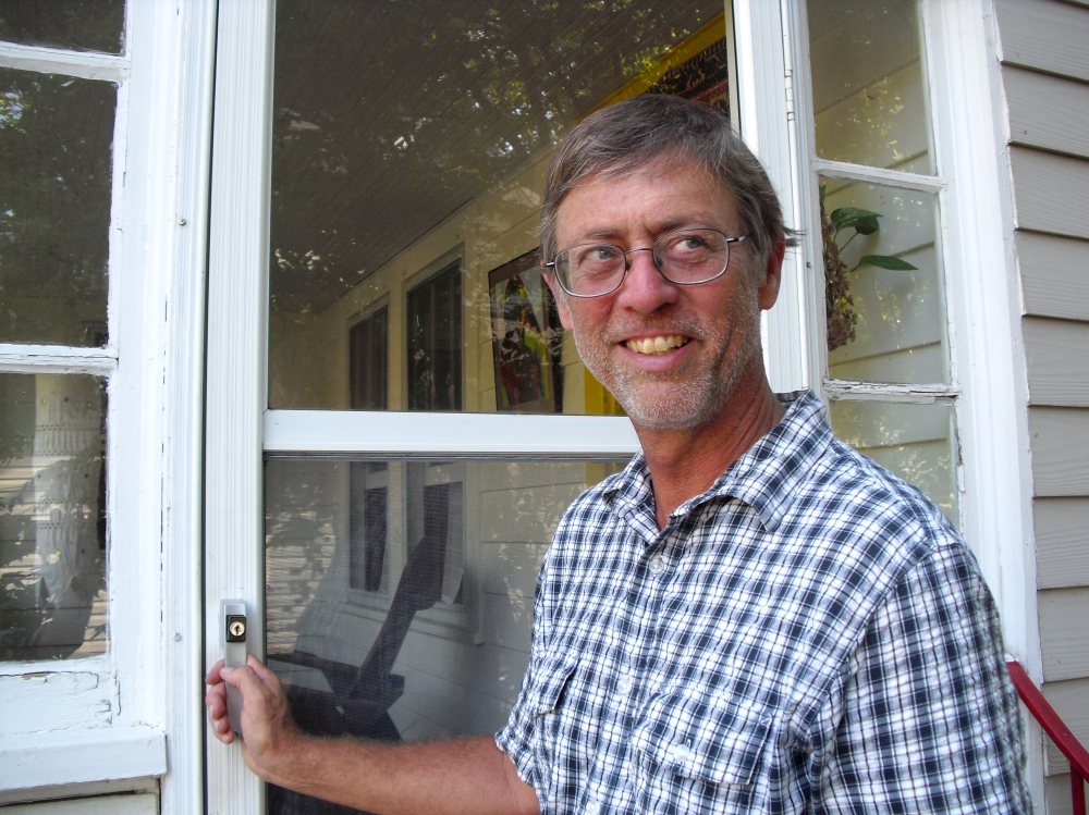 Stan Cox has air conditioning in his Kansas house — but he only runs the unit about once a year, he says. (Kansas Public Radio)