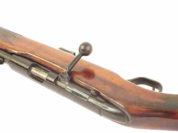 Bolt-action rifle.