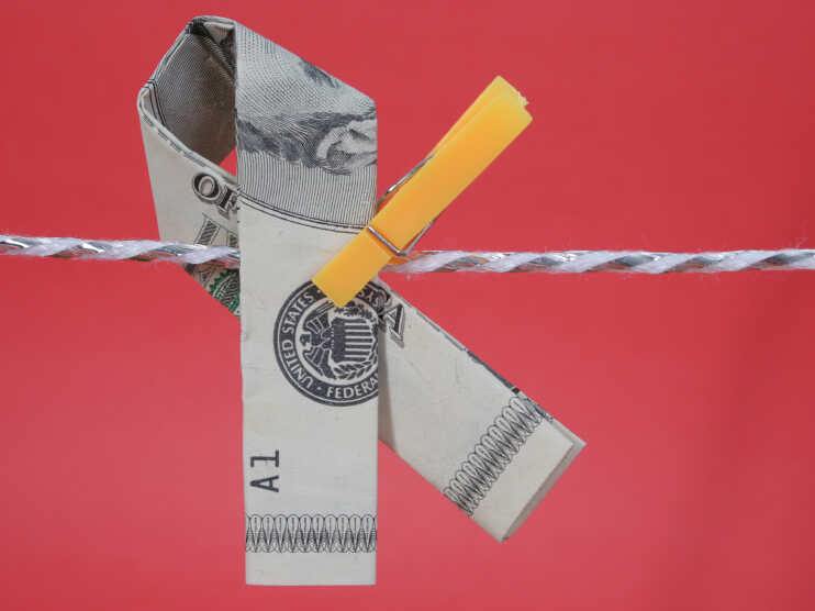 A memorial ribbon fashioned from U.S. currency.