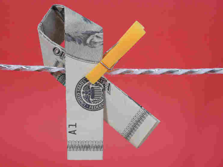 A memorial ribbon fashioned from U.S. currency.