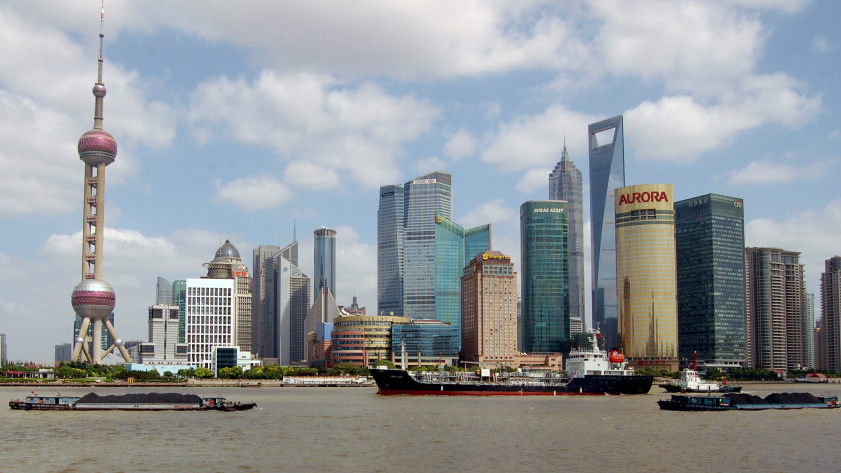 <p>Lujiazui, Shanghai's financial district, includes the world's third- and sixth-tallest buildings. The city's population is 23 million.</p> (NPR)