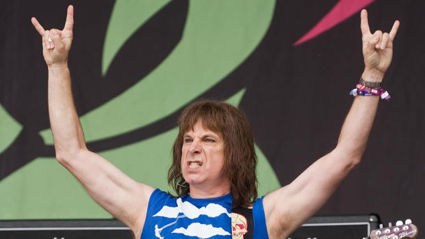 <strong>The Devil's 11's:</strong> Spinal Tap's Nigel Tufnel (a.k.a. Christopher Guest) in concert in 2009. If only he had three arms. (Getty Images)