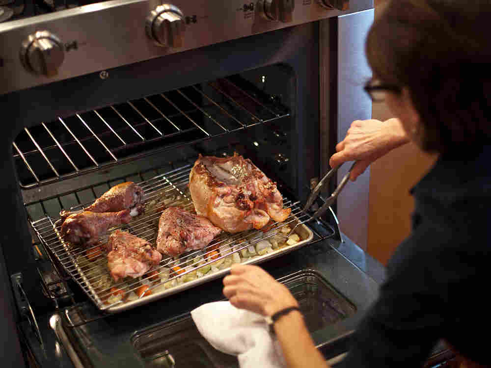 Taking the roast out of the oven.