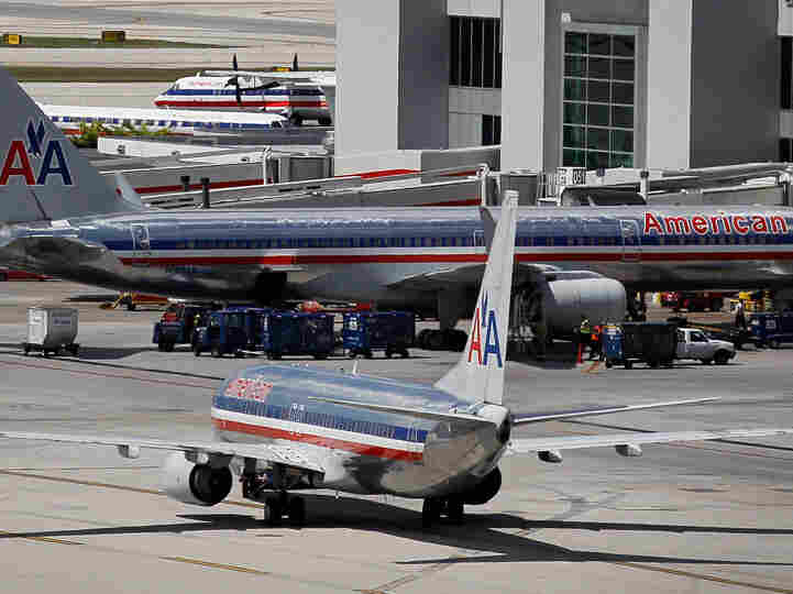 American Airlines planes sit on the tarmac at Miami International Airport.