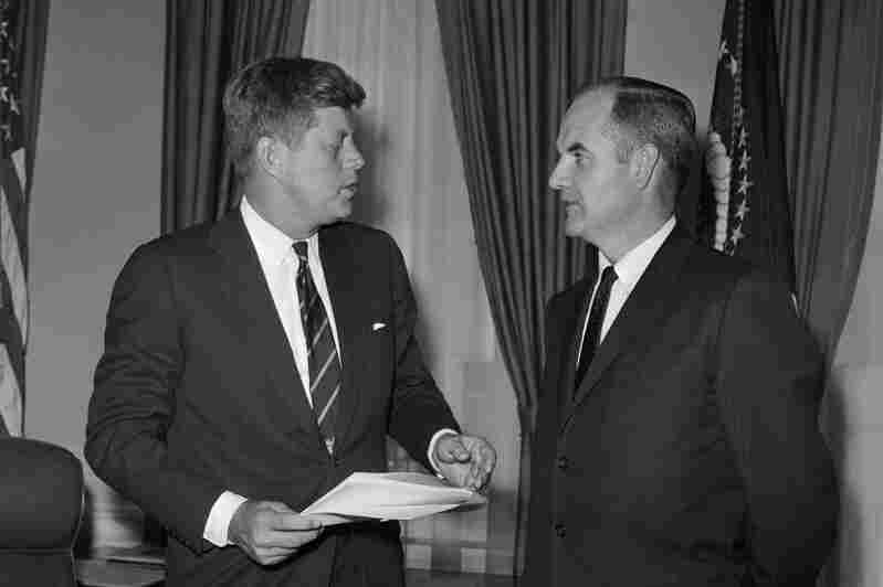 President John F. Kennedy talks with McGovern, at the time a special presidential assistant and director of the Food for Peace program, at the White House in 1961.