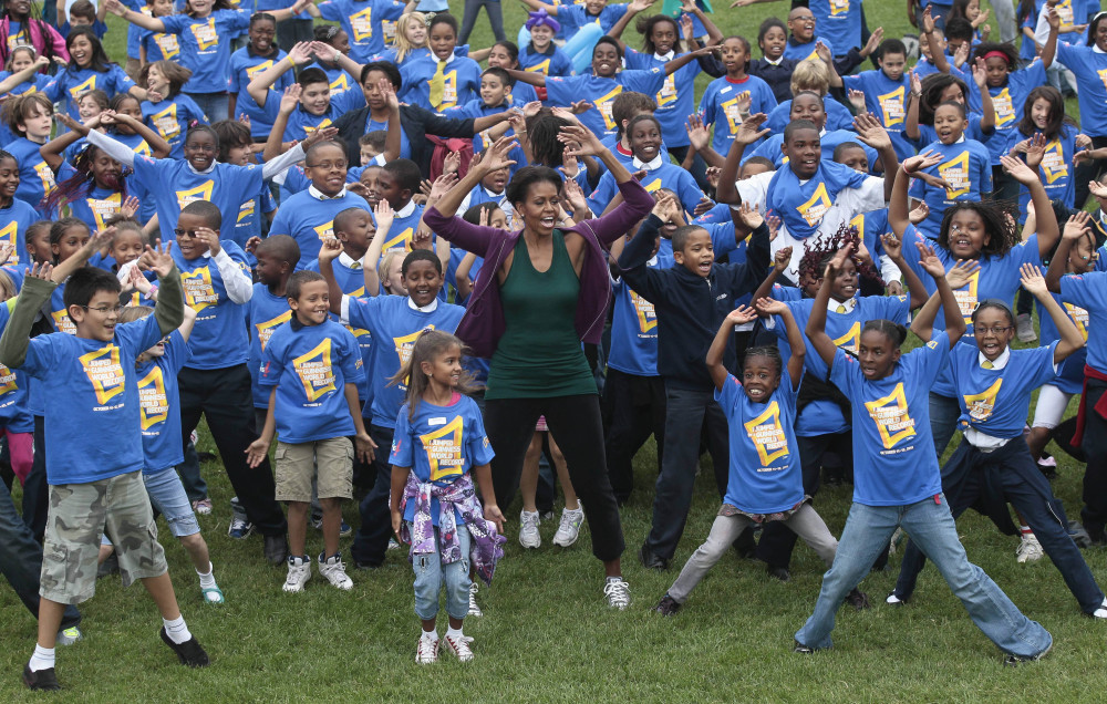 First lady Michelle Obama kicks off jumping jack world record attempt at the White House on Oct. 11, 2011. (ASSOCIATED PRESS)