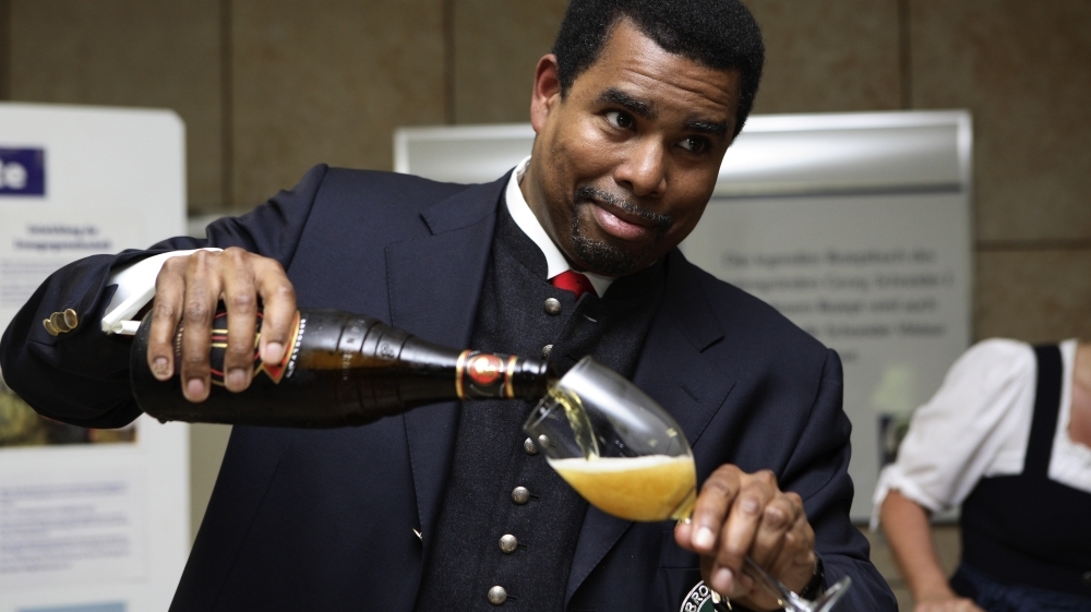Garrett Oliver pours beer at one of the hundreds of tastings he has led during his career. (Courtesy of Brooklyn Brewery)