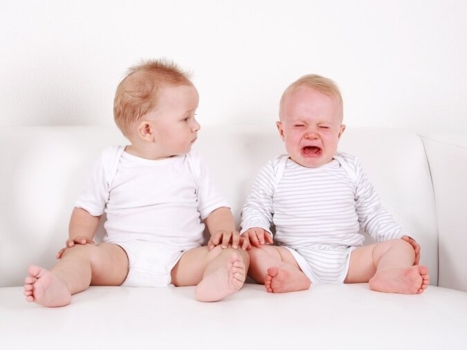 two babies crying