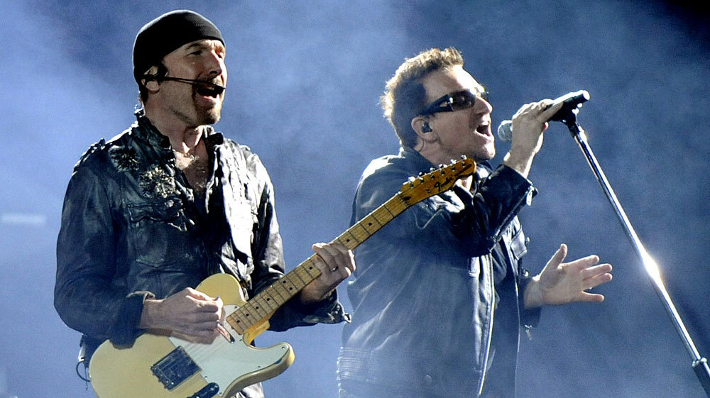 The Edge and Bono performing in June at the Oakland, Calif., stop of U2's 360˚ Tour — the most successful in history. (Getty Images)
