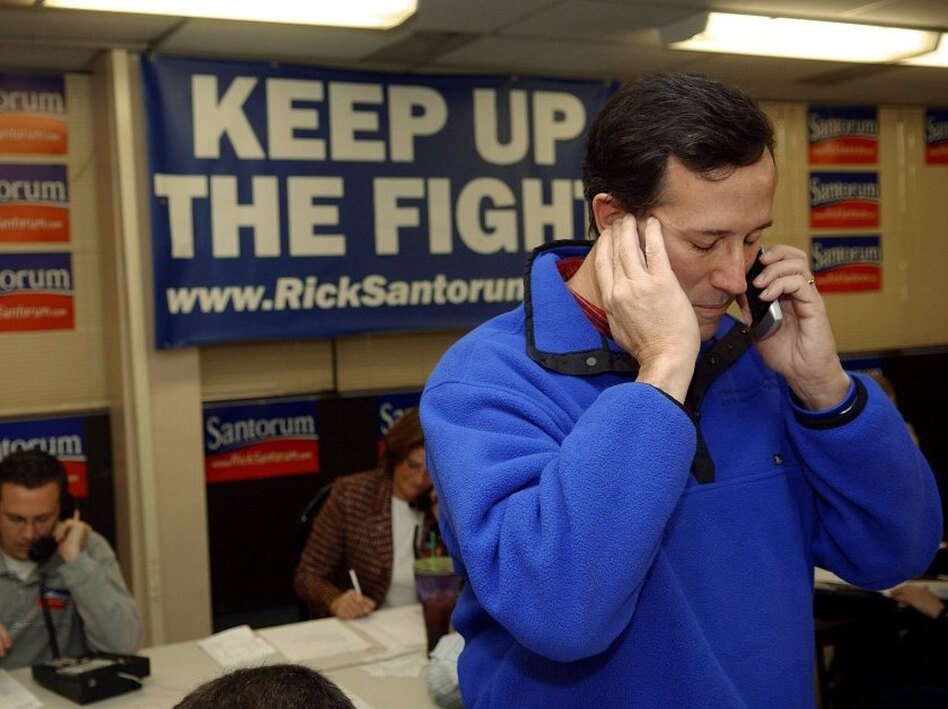 Rick Santorum receives a call at his campaign headquarters during his Senate re-election bid in 2006. The former senator was attempting to keep his Pennsylvania Senate seat, which he later lost to Democrat Bob Casey Jr. (Jeff Swensen/Getty Images)