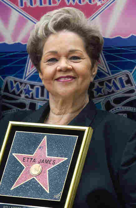 Singer Etta James displays her star during a ceremony honoring her on the Hollywood Walk of Fame April 18, 2003 in Hollywood, California. 