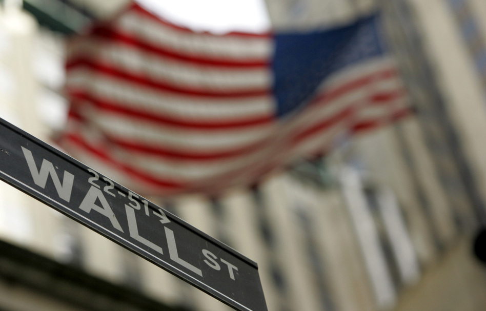 Recent surveys show that a large percentage of graduates from the nation's top schools are taking jobs in consulting or financial sector. (Mary Altaffer/AP)