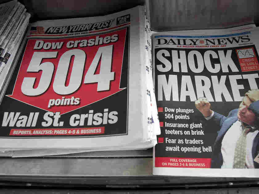 Newspapers are seen for sale at a newsstand Sept. 16, 2008, in New York City. U.S. stocks were mixed after the Dow Jones industrial average plunged 4.4 percent or 504 points.