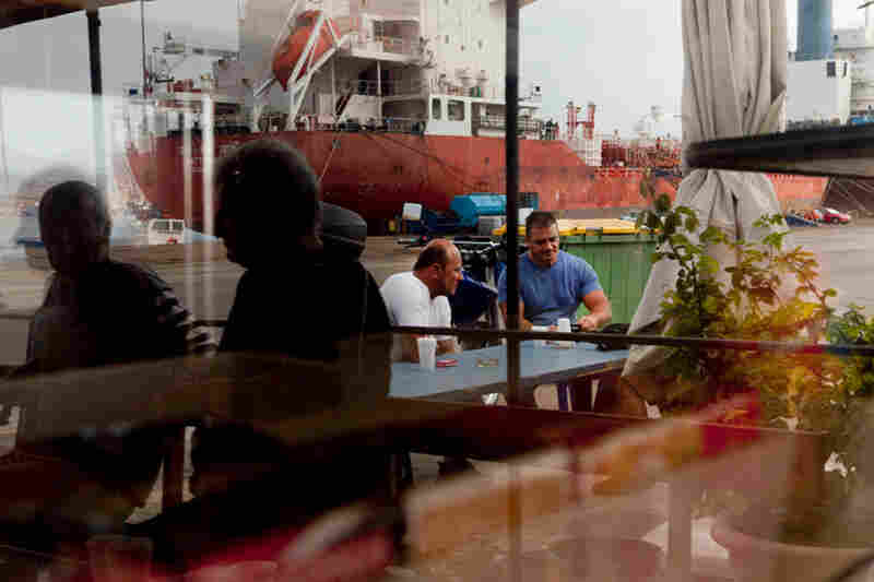 Most workers wait all day in cafeterias throughout the dock area. A few workers have committed suicide after losing their jobs and homes.